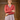 Model wearing the cardigan over a dress.