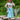 Redhead woman in straw hat posing outdoors in Malt Shake beige Daydream cardigan and blue printed dress