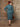 Rear view of model wearing the skirt suit.