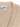 Close up of powderpuff beige knit cardigan showing textured pointelle trim along V-neckline
