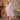 Blonde woman posing in 1940s pink chrysanthemum floral shirtwaist dress holding pink bag