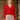 Model wearing 1950s style lipstick red cardigan buttoned over a vintage plaid dress